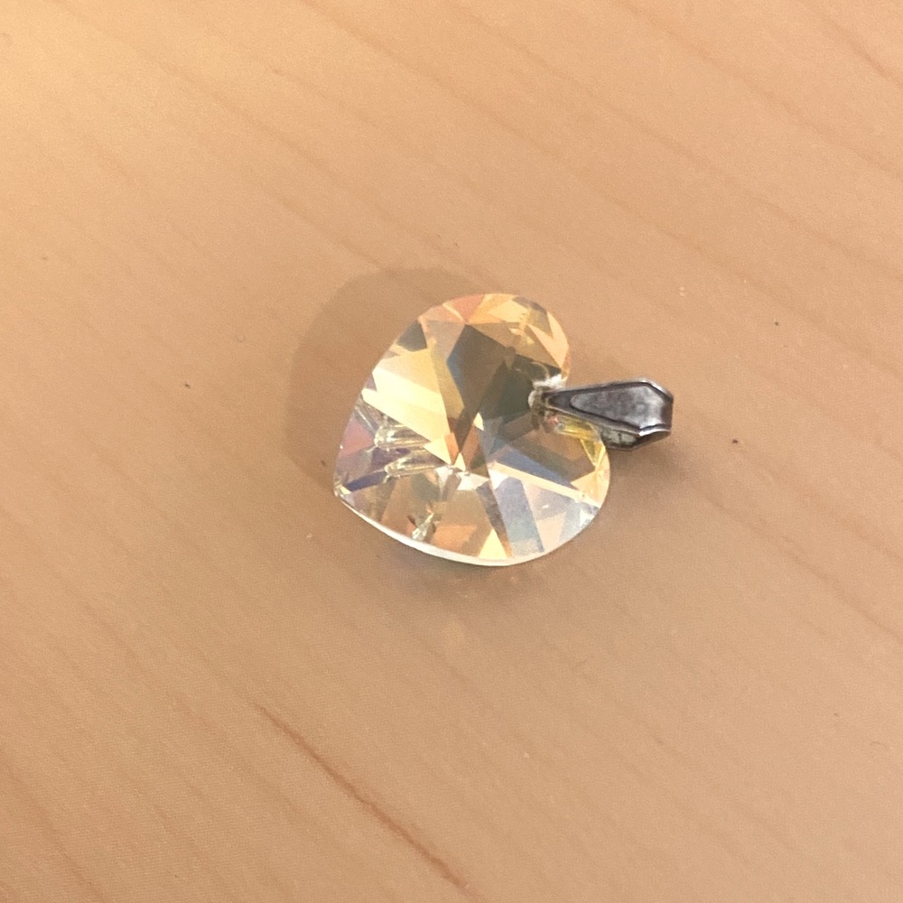 Swarovski heart! Good condition. Dainty. Can be put on any necklace!
